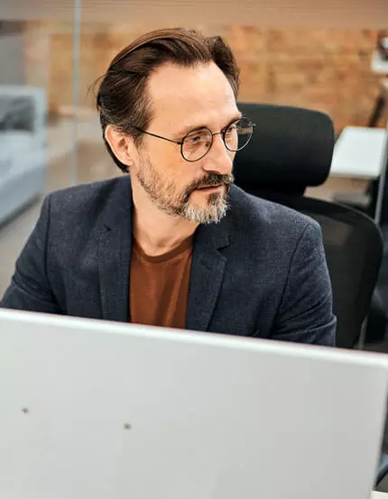 Consultant working at a desk in a modern office
